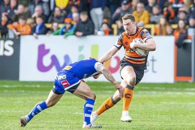James Clare on the attack against St Helens in Tigers' final game before the Covid-19 shutdown. Picture by Tony Johnson.
