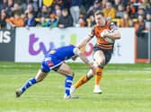 James Clare on the attack against St Helens in Tigers' final game before the Covid-19 shutdown. Picture by Tony Johnson.