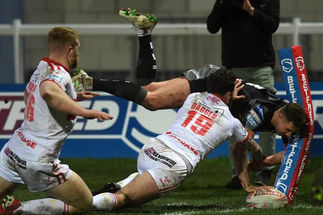 James Clare scores a spectacular try during Tigers' win at Hull KR this year. Picture by Jonathan Gawthorpe.