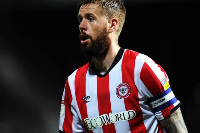 LOOKING UP: Brentford captain Pontus Jansson. Photo by Alex Burstow/Getty Images.