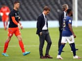 DISAPPOINTED: Fulham boss Scott Parker, centre, after his side's 2-0 defeat to Brentford at Craven Cottage. Photo by Bryn Lennon/Getty Images.