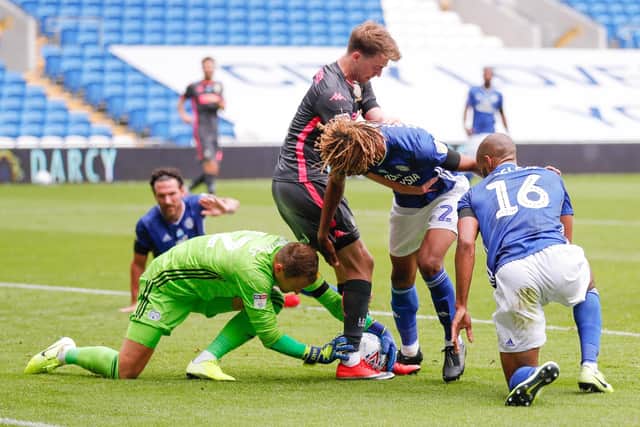 Cardiff City goalkeeper Alex Smithies get to the ball before Leeds United's Patrick Bamford. Picture: Varleys.