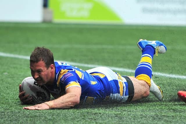 Danny McGuire touches down against Widnes in 2014. Picture: Ste Jones/KT8PHOTOGRAPHY