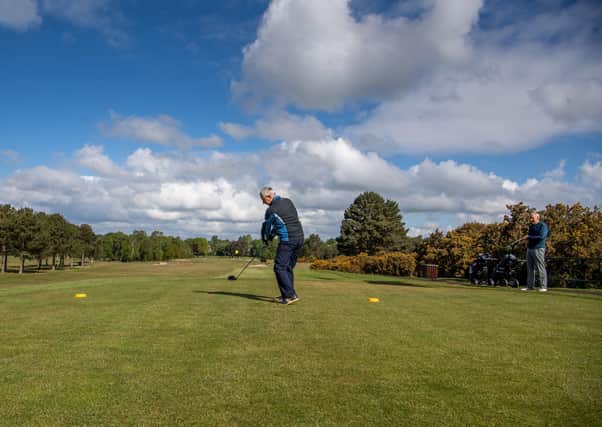 BACK IN THE GAME: Graham Holden tees off at Moortown Golf Club last month after the coronavirus lockdown restrictions were eased. Picture James Hardisty.