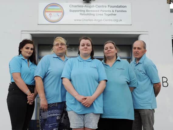 . Carrie-Ann Curtis, centre, with Chloe Hill, Ruth Curtis, Sam Key and Clive Key at the Charlies Angels Centre Foundation in Leeds.... Carrie-Ann Curtis set up a charity for bereaved parents after the death of her baby son Charlie at just 19-day's old from a rare disorder called Potter's Syndrome. ... Picture Tony Johnson.
