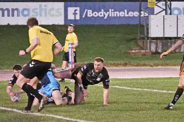 Hunslet's Ben Markland scores the winning try in a pre-season game against Batley Bulldogs.