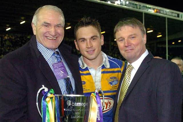 Caddick and Hetherington flank captain Kevin Sinfield and the World Club Challenge trophjy at Elland Road in 2005. Picture by Steve Riding.
