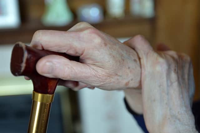 A man has been arrested on suspicion of fraud after an elderly resident was targeted in Leeds