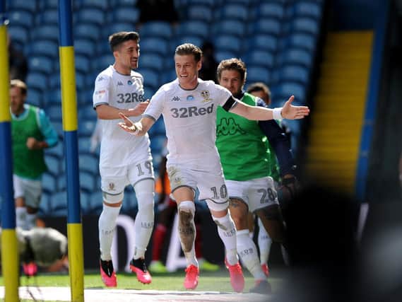 GAME CHANGERS - Pablo Hernandez and Gjanni Alioski celebrating the latter's goal in Leeds United's 3-0 win over Fulham. Pic: Simon Hulme