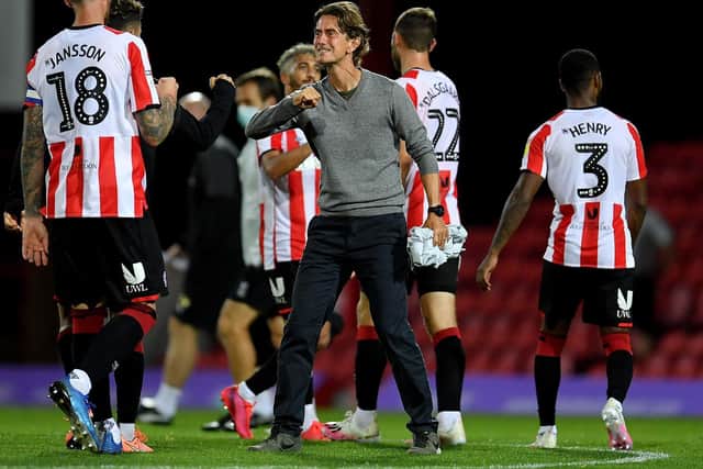 JOB DONE - AGAIN: Brentford boss Thomas Frank, centre, celebrates his side's victory at home to leaders West Brom, one week after their 2-0 triumph at Fulham. Photo by Justin Setterfield/Getty Images.