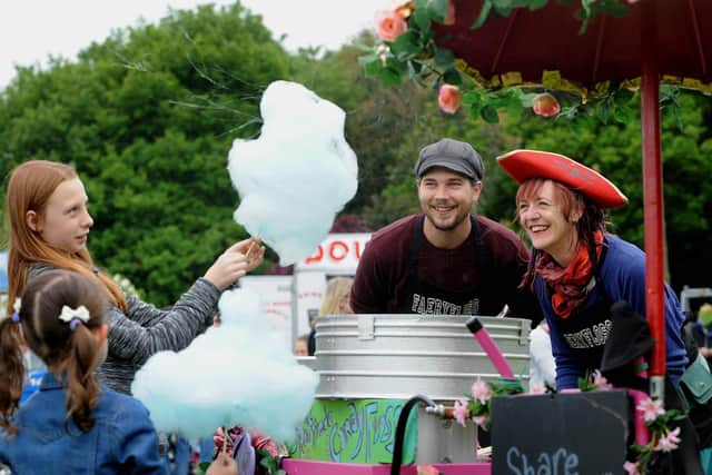 From the archive: Sara Rushworth and Joe Hogan from Faery Floss serve up candy floss to children at a fun day held during a previous year's Meanwood Festival. Picture: Simon Hulme