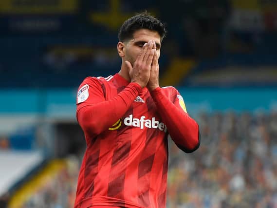 POCKET WATCH - Aleksandar Mitrovic briefly escaped Ben White's pocket to land an elbow, joked Angus Kinnear in his Leeds United programme notes. (Pic: Getty)