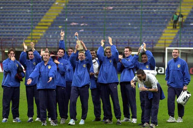 The team enjoy a singalong with the fans in the San Siro. PIC: Varley Picture Agency