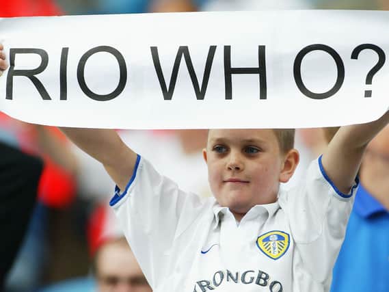 A Leeds United fan voices his displeasure at Rio Ferdinand's exit. (Getty)