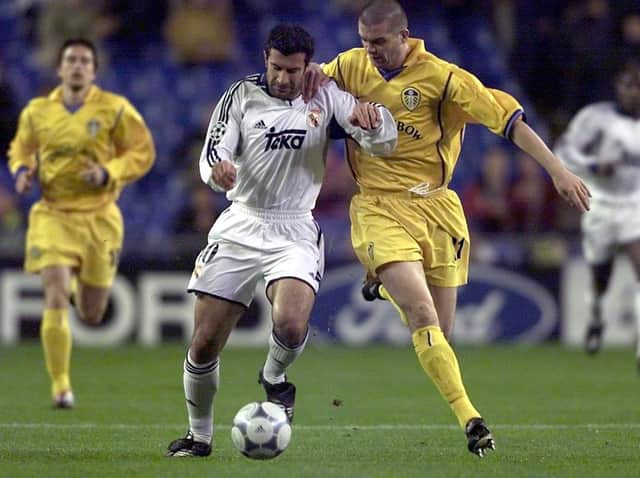 GREATNESS - Dom Matteo brushing shoulders with Luis Figo in Leeds United's clash with Real Madrid. Pic: Getty