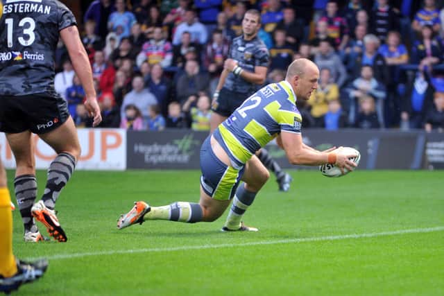 Carl Ablett touches down against Hull FC in July 2012. Picture: Steve Riding.