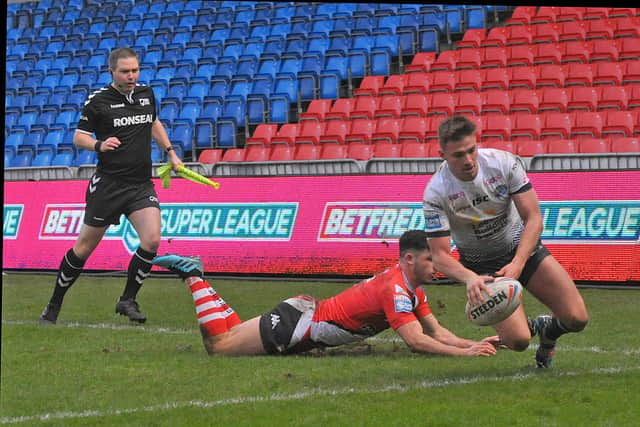 Jack Walker scores in Rhinos' win at Salford in February. Picture by Steve Riding.