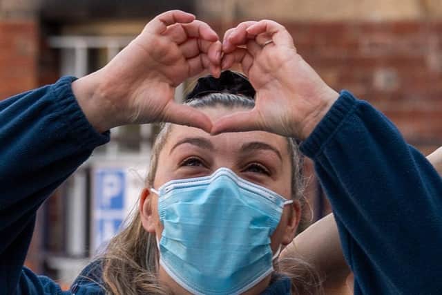 Showing the love for the NHS in the 72nd anniversary Clap for Carers event.