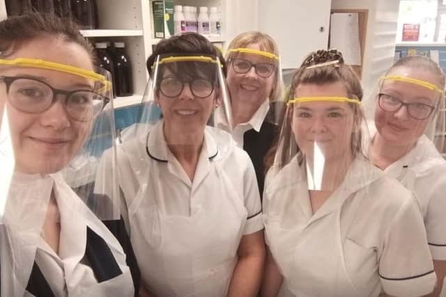 Ladies from Hessle Pharmacy wearing some of the PPE.
