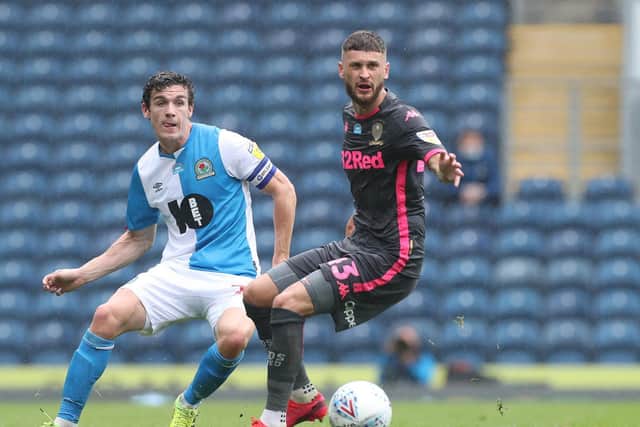EVER PRESENT: Leeds United midfielder Mateusz Klich, right, battles with Blackburn Rovers' Darragh Lenihan in Saturday's 3-1 win at Ewood Park as Klich started an 89th consecutive league game. Photo by Ross Kinnaird/Getty Images.