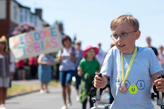 Tobias completing his first marathon challenge in May. Picture: Joe Giddens/PA Wire