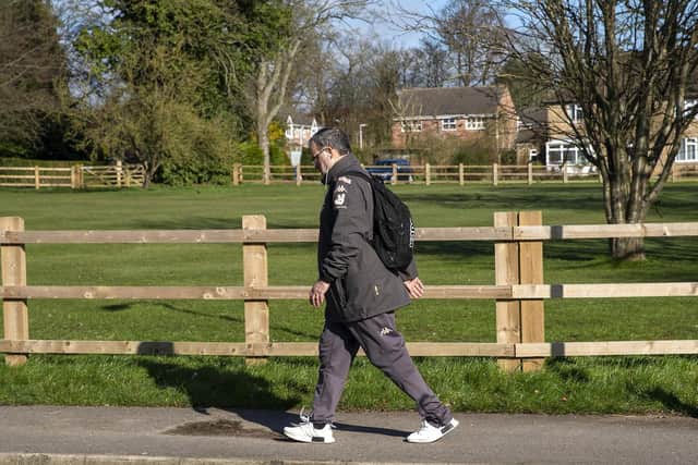 THE OFFICE - Leeds United head coach Marcelo Bielsa on his way into work, where his standards have helped the Thorp Arch academy achieve Category One status. Pic: PA
