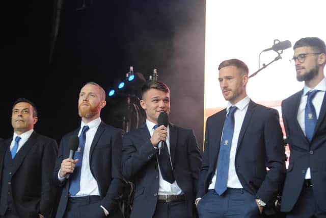 YOUNG PUP: Jamie Shackleton with some of his Leeds United team mates and chairman Andrea Radrizzani, left, as the club celebrate their centenary last October. Picture by Tony Johnson.
