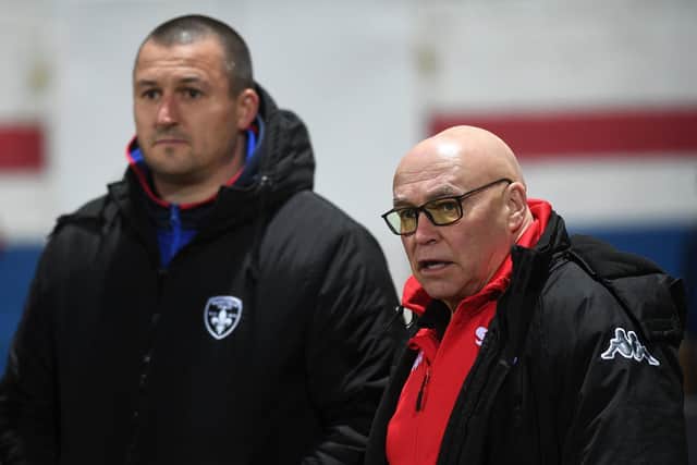 Bulls coach John kear, right, with Wakefield's Chris Chester. Picture by Jonathan Gawthorpe.