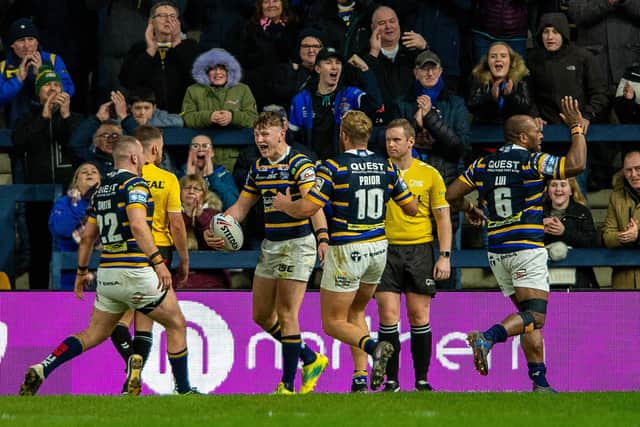 Harry Newman, centre, celebrates scoring a try this season.
Picture: Bruce Rollinson.