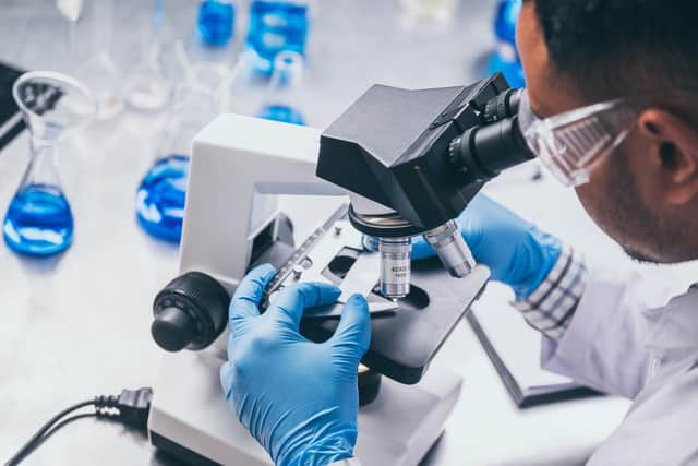 Health care researchers working in life science laboratory.