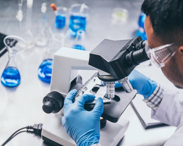 Health care researchers working in life science laboratory.