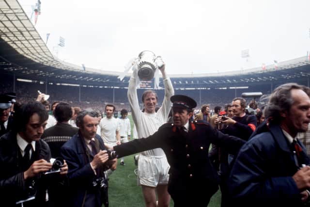 CLUB LEGEND: Leeds United's Jack Charlton celebrates with the FA Cup after his team's 1-0 win in 1972. Picture: PA.