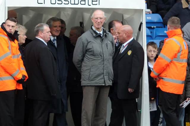 WHITES GREATS: Jack Charlton, centre, and Norman Hunter, left, look on as Leeds United take on Leicester City at Elland Road in January 2014. Picture by Simon Hulme.