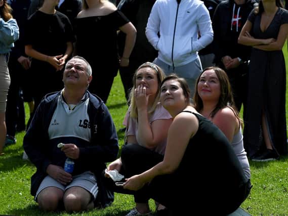 George's family look on as the biodegradable balloons are released in his memory (Photo: Simon Hulme)