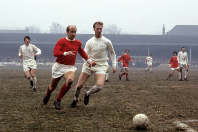 A photo from 1969 of Leeds United legend Jack Charlton battling for the ball against his younger borther Bobby Charlton of Manchester United fame.