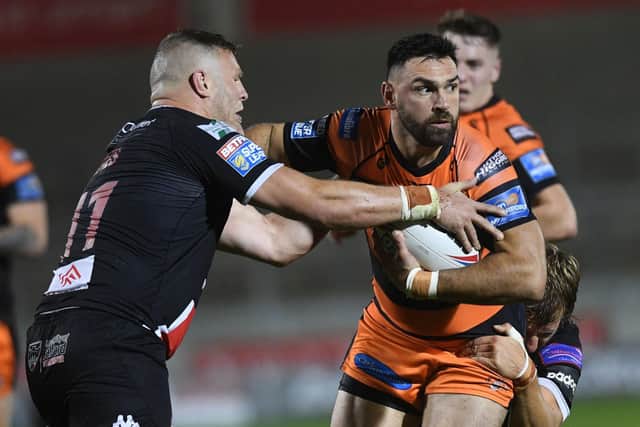 Castleford's Matt Cook, right, wants another year at Wheldon Road (
Picture: Jonathan Gawthorpe
)