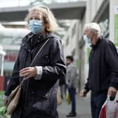 The UK government has announced that people entering shops will be required to wear a face mask by law from July 24. (Photo by Christopher Furlong/Getty Images)