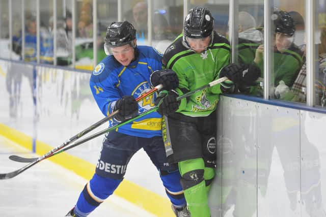 Lewis Baldwin battles on the boards for Leeds Chiefs against Hull Pirates at Elland Road. picture: Dean Woolley.