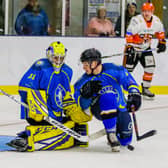 STAY OUT: Leeds Chiefs' netminder Sam Gospel and defenceman Lewis Baldwin (right) defend the net against Telford Tigers at Elland Road last season. Picture courtesy of Mark Ferriss