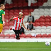 SIMULATION: Brentford's Said Benrahma goes to ground despite Preston North End defender Patrick Bauer not making any contact with the forward in Wednesday's clash at Griffin Park. Photo by Alex Burstow/Getty Images.