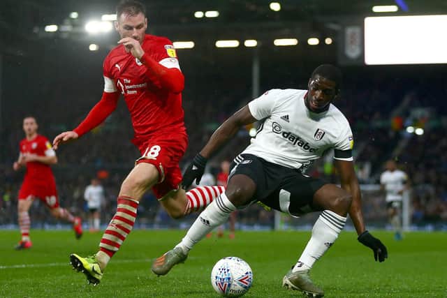 IMPROVEMENTS: To the Barnsley defence since the arrival of Michael Sollbauer, left, pictured challenging Fulham's Aboubakar Kamara during the Championship clash at Craven Cottage in February. Photo by Jordan Mansfield/Getty Images.