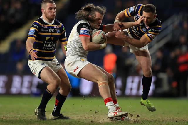 Liam Kay in action against Leeds Rhinos. Picture: PA.