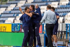 MOMENTOUS: Huddersfield Town boss Danny Cowley, left, celebrates Huddersfield Town's 2-1 victory against West Brom that sent Leeds United up. Picture Bruce Rollinson
