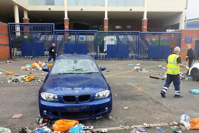 The BMW was damaged amidst the celebrations (photo: SWNS).
