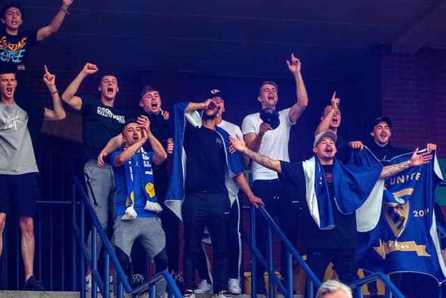 Leeds United's players celebrate at Elland Road as promotion is confirmed. (Bruce Rollinson)