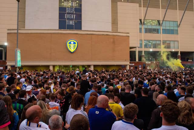 Leeds United fans celebrate at Elland Road. (Bruce Rollinson)
