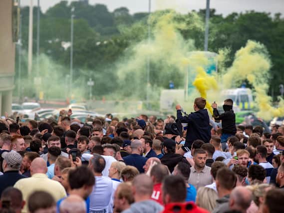 Fans celebrating promotion at Elland Road