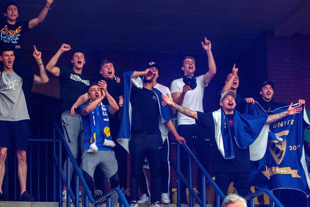 CHAMPIONS: Leeds United's players celebrate promotion at Elland Road on Friday night. The club have now sealed the Championship title the next day. Picture by Bruce Rollinson.