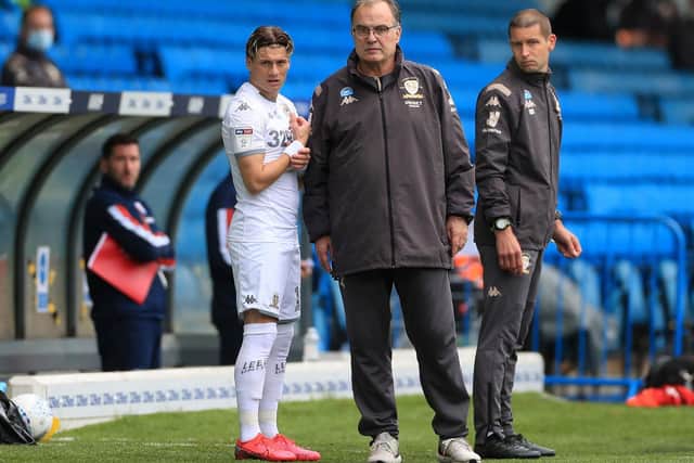 Leeds United's Gjanni Alioski with Marcelo Bielsa. (PA)
