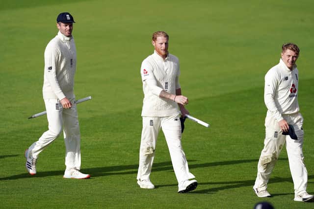 CENTRE STAGE: England's Ben Stokes walks off with a stump after the hosts' win against West Indies at Old Trafford. Picture: Jon Super/NMC Pool/PA